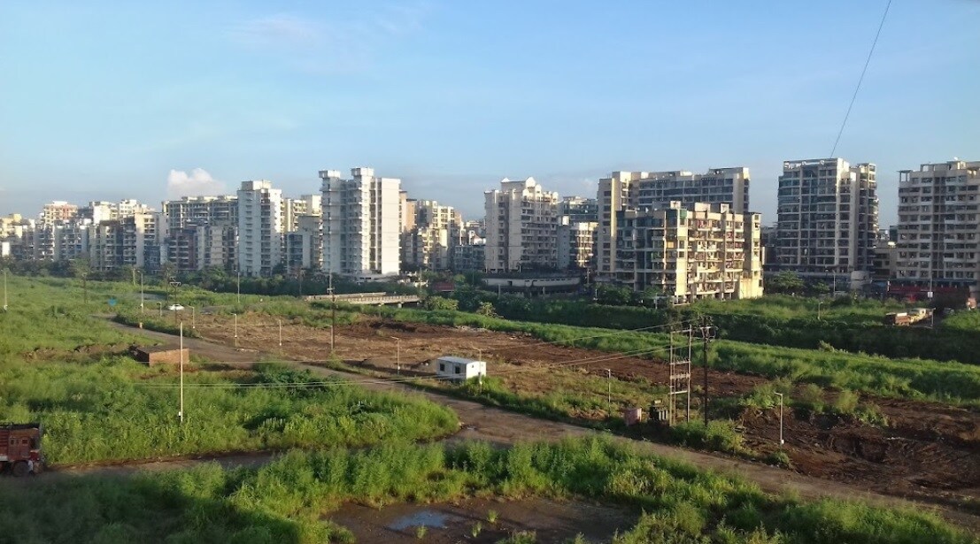 Khandeshwar_a city with a lot of buildings and trees